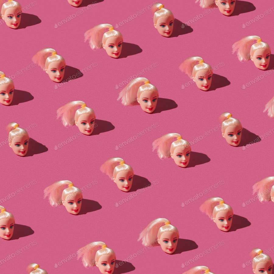 Cover for Pattern made of doll heads on pink background.