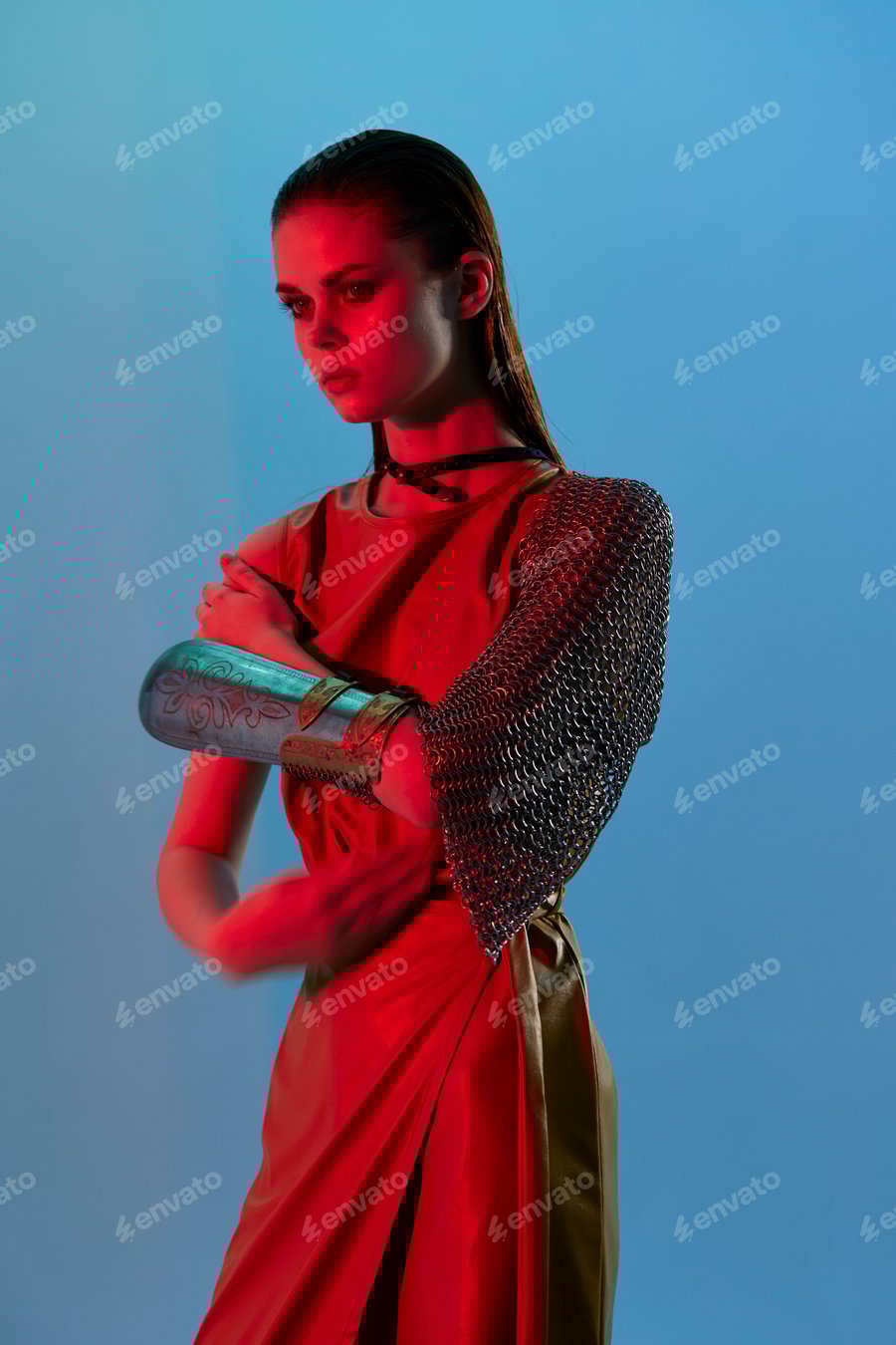 Cover for young woman Glamor posing red light metal armor on hand Lifestyle unaltered